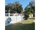 White vinyl privacy fence with decorative sunburst tops at 2426 Dresden Trl, Apopka, FL 32712