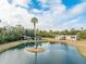 Aerial view showing a home, pond, and outbuildings on a spacious property at 2570 Canvasback Trl, Geneva, FL 32732