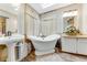 Elegant bathroom featuring a freestanding soaking tub and skylight at 2570 Canvasback Trl, Geneva, FL 32732