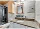 Bathroom features granite countertop, white cabinets, and walk-in shower at 2570 Canvasback Trl, Geneva, FL 32732