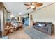 Spacious living area featuring hardwood floors and a ceiling fan at 2570 Canvasback Trl, Geneva, FL 32732
