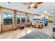 Bright living room with water views and access to kitchen at 2570 Canvasback Trl, Geneva, FL 32732