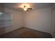 Simple bedroom with ceiling fan and window blinds at 2620 Lancaster Ct, Apopka, FL 32703