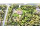 Property view showing home and surrounding land at 2647 Zuni Rd, St Cloud, FL 34771