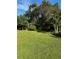 Expansive backyard with mature trees at 2647 Zuni Rd, St Cloud, FL 34771