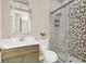 Modern bathroom with a glass shower and updated vanity at 2647 Zuni Rd, St Cloud, FL 34771
