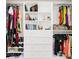 Well-organized closet with shelves, drawers, and hanging rods at 2647 Zuni Rd, St Cloud, FL 34771