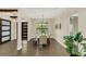 Dining area with wood floors and farmhouse table at 2647 Zuni Rd, St Cloud, FL 34771