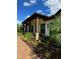 Home with walkway, landscaping, and covered porch at 2647 Zuni Rd, St Cloud, FL 34771