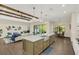 Island kitchen with quartz countertops and stainless steel appliances at 2647 Zuni Rd, St Cloud, FL 34771