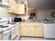 This kitchen features an electric range, plenty of cabinet space, and a microwave for easy meal preparation at 2740 Maitland Crossing Way # 1, Orlando, FL 32810