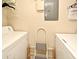 Functional laundry room with washer, dryer, and storage solutions for convenient chore management at 2740 Maitland Crossing Way # 1, Orlando, FL 32810