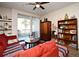 Bright and cozy living area featuring a comfortable sectional sofa and a sliding glass door at 2740 Maitland Crossing Way # 1, Orlando, FL 32810