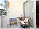 Cozy patio featuring outdoor seating with pillows and a small table at 2740 Maitland Crossing Way # 1, Orlando, FL 32810