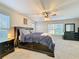 Spacious Primary bedroom with large windows and plush carpeting at 30722 Cove Rd, Tavares, FL 32778