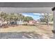 Spacious backyard with shed and partially fenced yard at 37 Hickory Track Way, Ocala, FL 34472