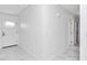 Bright entryway with white walls and marble flooring at 37 Hickory Track Way, Ocala, FL 34472