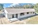 Rear view of a newly renovated house with a patio at 37 Hickory Track Way, Ocala, FL 34472