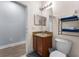 Clean bathroom with a single sink vanity and toilet at 3715 Calabria Ave # 0, Davenport, FL 33897