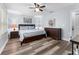 King bedroom with ceiling fan and gray walls at 3715 Calabria Ave # 0, Davenport, FL 33897