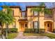 Two story townhome with landscaping at 3715 Calabria Ave # 0, Davenport, FL 33897
