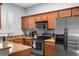 Modern kitchen with stainless steel appliances and granite countertops at 3715 Calabria Ave # 0, Davenport, FL 33897