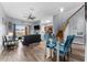 Open living and dining space with glass table and patio access at 3715 Calabria Ave # 0, Davenport, FL 33897
