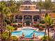 Resort-style pool with surrounding lounge chairs at 3715 Calabria Ave # 0, Davenport, FL 33897