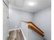 Simple staircase with wooden handrail at 3715 Calabria Ave # 0, Davenport, FL 33897