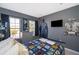 Star Wars themed bedroom with double bed, dresser, and large TV at 4706 Vero Beach Pl, Kissimmee, FL 34746