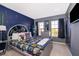 Star Wars themed bedroom with double bed, dresser, and large TV at 4706 Vero Beach Pl, Kissimmee, FL 34746