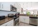 Kitchen with stainless steel appliances and granite counters at 4706 Vero Beach Pl, Kissimmee, FL 34746