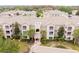 Aerial view of community showing building and landscaping at 4881 Cypress Woods Dr # 3309, Orlando, FL 32811