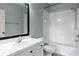 Bathroom with shower/tub combo and white tile at 4881 Cypress Woods Dr # 3309, Orlando, FL 32811