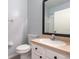 Clean bathroom with a vanity, toilet, and shower at 4881 Cypress Woods Dr # 3309, Orlando, FL 32811