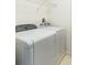Laundry closet with Whirlpool washer and dryer at 4881 Cypress Woods Dr # 3309, Orlando, FL 32811