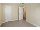 Spacious bedroom with double closets and access to a bathroom at 5216 Montague Pl, Orlando, FL 32808