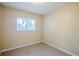 Cozy bedroom with tile floors and window coverings at 5216 Montague Pl, Orlando, FL 32808