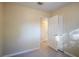 Spacious bedroom with neutral walls and ample closet space at 5216 Montague Pl, Orlando, FL 32808