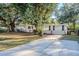 Ranch home with a long driveway and spacious yard at 5216 Montague Pl, Orlando, FL 32808
