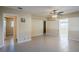 Bright living room featuring tile floors and ceiling fan at 5216 Montague Pl, Orlando, FL 32808