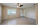 Spacious living area with tile floors and a view of the front yard at 5216 Montague Pl, Orlando, FL 32808