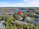 Aerial view showing the condo's location by a lake at 604 Northlake Dr, Sanford, FL 32773