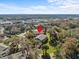 An aerial view of a condo building nestled in a lush, tree-lined community at 604 Northlake Dr, Sanford, FL 32773