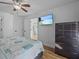 Bright bedroom with a dresser and ensuite access at 604 Northlake Dr, Sanford, FL 32773