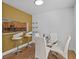 Dining area with a glass table and four chairs at 604 Northlake Dr, Sanford, FL 32773
