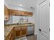 Modern kitchen with granite countertops and stainless steel appliances at 604 Northlake Dr, Sanford, FL 32773