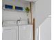 Laundry room with washer, dryer, and shelving at 604 Northlake Dr, Sanford, FL 32773
