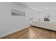 Living area with hardwood floors and white couch at 604 Northlake Dr, Sanford, FL 32773
