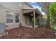 Covered patio with tile flooring, ceiling fan, and access to backyard at 8426 Chamberlain Pl, Oviedo, FL 32765